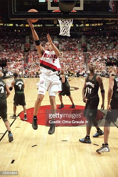 Bonzi Wells of the Portland Trailblazers makes a layup during the NBA Western Conference Playoffs Round One Game against the Minnesota Timberwolves...