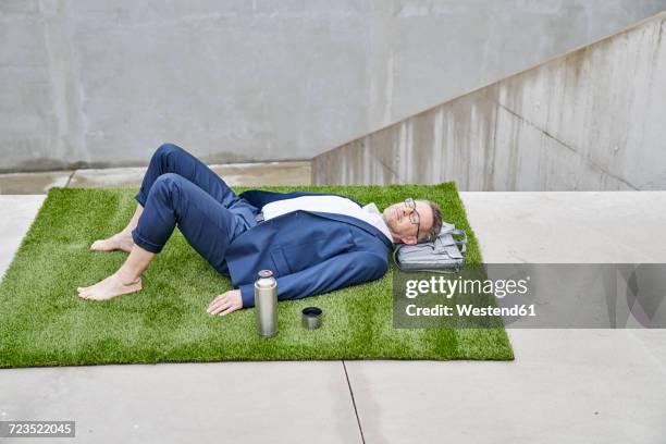 businessman having a break - eccentric stock pictures, royalty-free photos & images