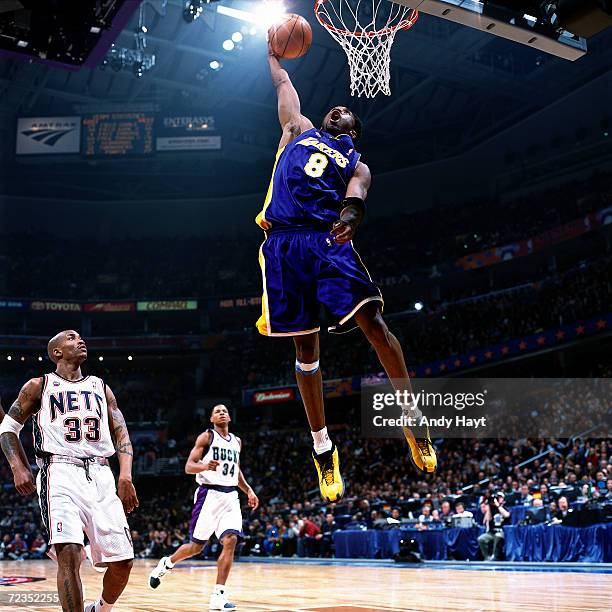 Kobe Bryant of the Los Angeles Lakers goes for a dunk during the 2001 NBA All Star Game at the MCI Center in Washington, DC. NOTE TO USER: User...