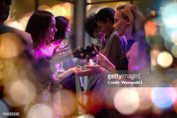 people socializing on a party - formele kleding stockfoto's en -beelden