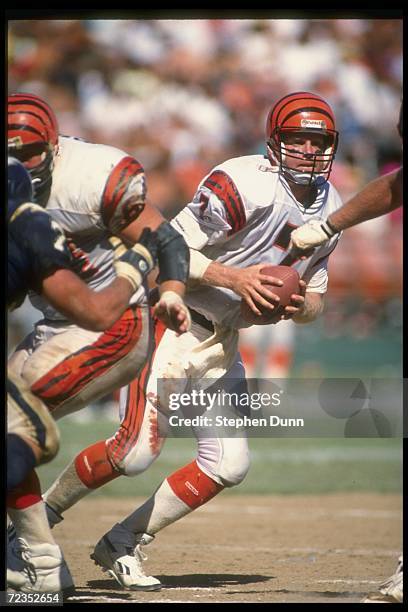 Quarterback Boomer Esiason of the Cincinnati Bengals looks to pass the ball during a game against the San Diego Chargers during a game at Jack Murphy...