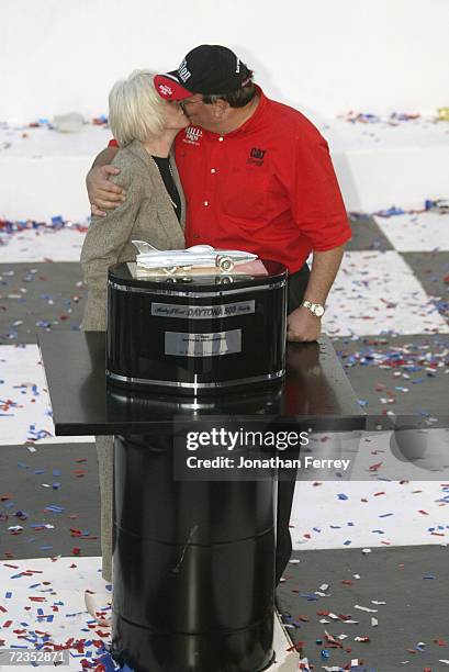 Team owners Bill and Gail Davis celebrate after Ward Burton driver of the Bill Davis Racing Dodge Intrepid R\\T won the 44th NASCAR Winston Cup...