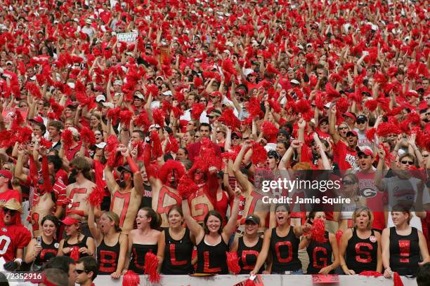 Fans of the Georgia Bulldogs cheer against the Louisiana State University Tigers during the game at Sanford Stadium on October 2, 2004 in Athens,...