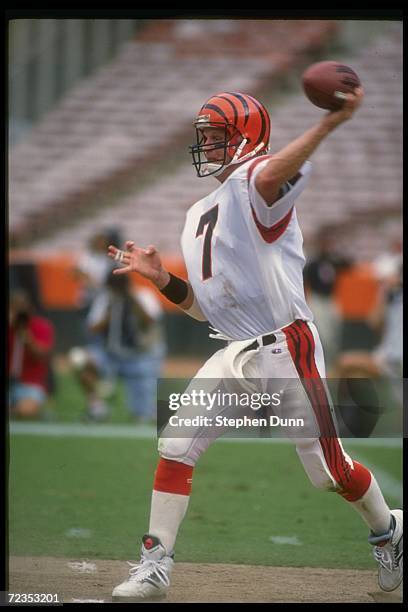 Quarterback Boomer Esiason of the Cincinnati Bengals looks to pass the ball during a game against the Los Angeles Rams at Anaheim Stadium in Anaheim,...