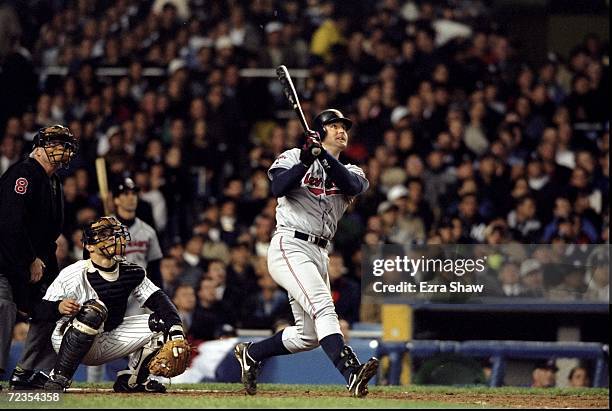 Infielder Jim Thome of the Cleveland Indians hits a grand slam home run during the American League Championships Series game against the New York...
