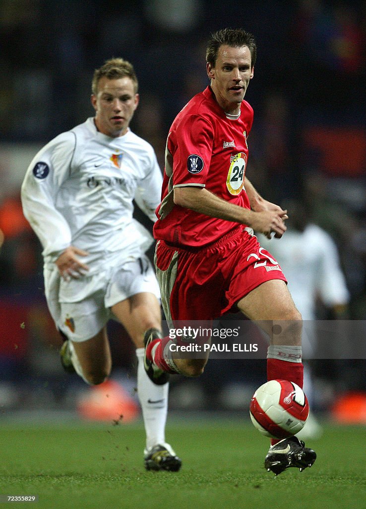 Blackburn Rovers' Andre Ooijer  (R) is c