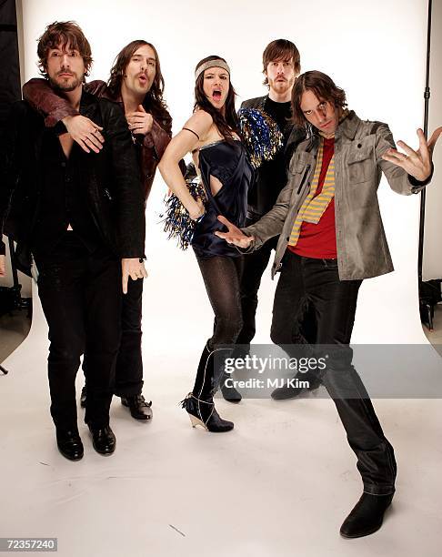 Singer Juliette Lewis and band members of Juliette and the Licks pose for a portrait in the backstage studio during the 13th annual MTV Europe Music...