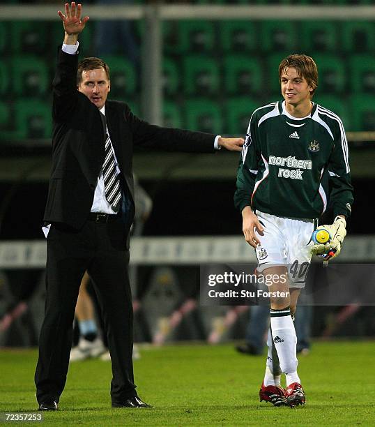 Tim Krul, goalkeeper of of Newcastle, and manager Glenn Roeder celebrate following the Group H UEFA Cup game between Palermo and Newcastle United on...
