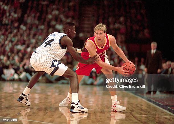 Anthony Bowie of the Orlando Magic gaurds Craig Ehio of the Atlanta Hawks as he tries to pass the ball during the pre-season game at the Wembley...