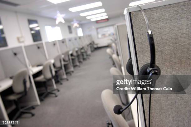Headset hangs on a cubical wall after the last telemarketing shift at Spectrum Marketing Services, Inc. September 26, 2003 in Philadelphia,...