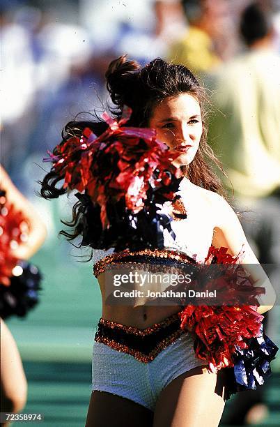 Cheerleaders for the Cincinnati Bengals cheers during a game against the Dallas Cowboys at the Riverfront Stadium in Cincinnati, Ohio. The Cowboys...