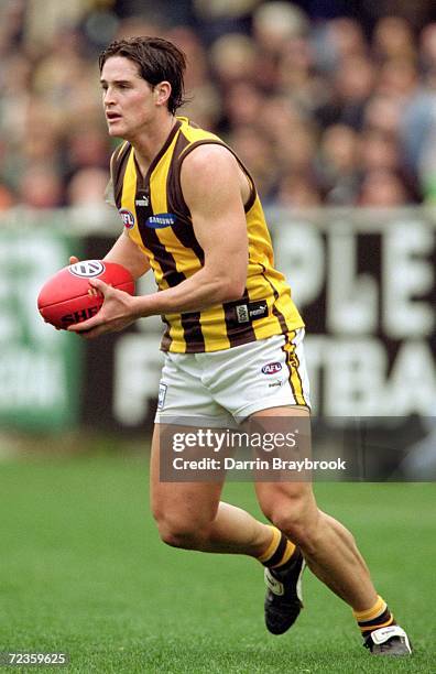 Trent Croad for Hawthorn in action during the round 16 AFL match played between the Collingwood Magpies and the Hawthorn Hawks held at the Melbourne...