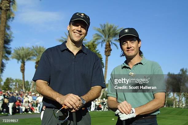 Actors David James Elliott and Kyle MacLachlan pose on the 10th hole during the openinground of the Bob Hope Chrysler Classic at Indian Wells Country...