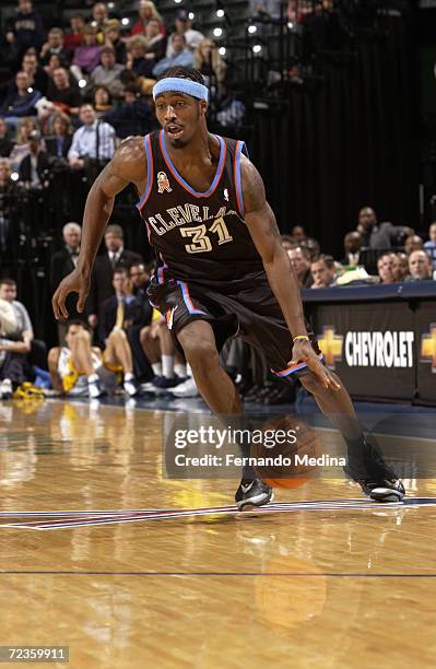 Guard Ricky Davis of the Cleveland Cavaliers dribbles the ball during the NBA game against the Indiana Pacers at Conseco Fieldhouse in Indianapolis,...