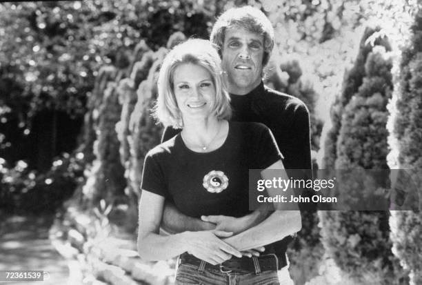 Composer Burt Bacharach Jr. Hugging his actress wife Angie Dickinson.