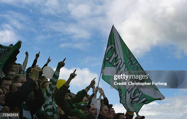 Celtic supporters celebrate winning the league during the Scottish Premier League match between Kilmarnock and Celtic at Rugby Park on April 18, 2004...