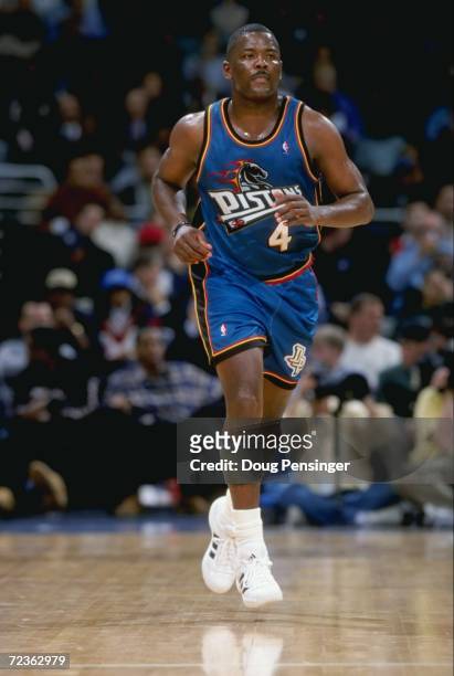 Joe Dumars of the Detroit Pistons heading down the court during the game against the Washington Wizards at the MCI Center in Washington, D.C. The...