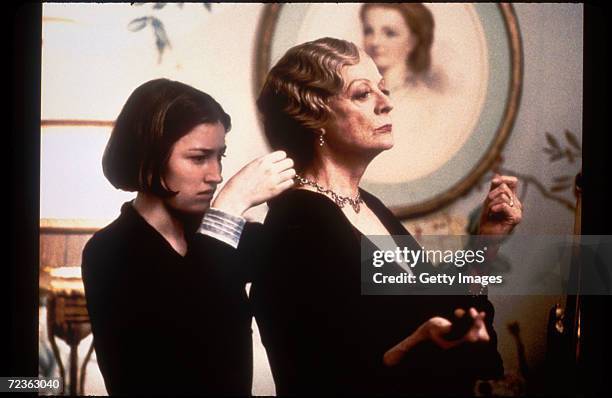 Actors Kelly MacDonald and Maggie Smith appear in a scene from the film "Gosford Park."
