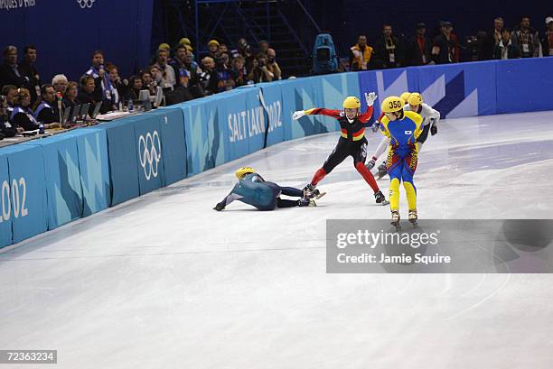 Steven Bradbury of Australia falls in the Men's 1500m Short Track Speed Skating heats during the Salt Lake City Winter Olympic Games at the Salt Lake...