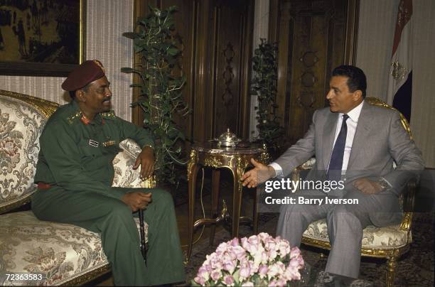 Sudanese leader Omar al-Bashir during meeting. With President Mubarak.