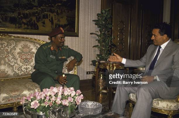 Sudanese leader Omar al-Bashir during meeting. With President Mubarak.