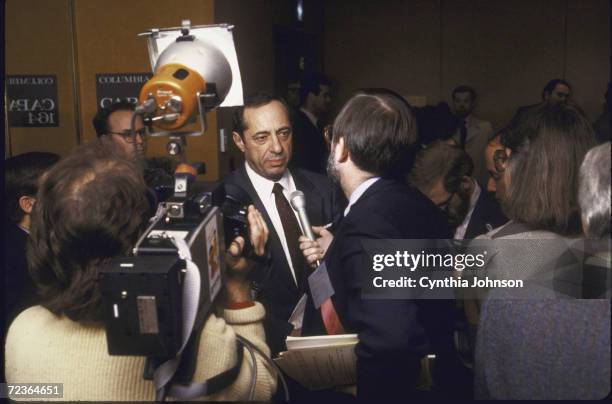 Governor Mario Cuomo talking to press during Governors conf.
