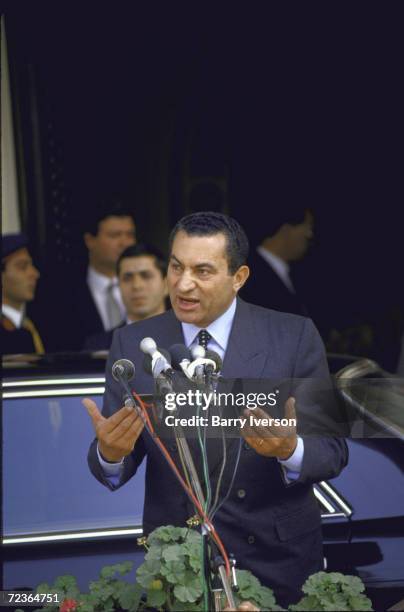 Egyptian President Husni Mubarak after meeting with PLO chrmn Yasser Arafat.