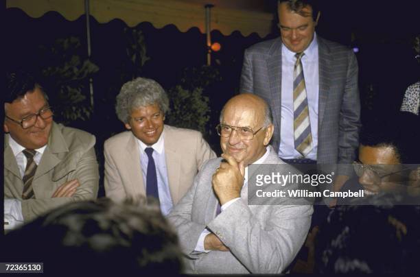 South African President P. With Botha at party for foreign press.