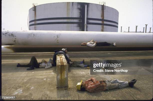Workers having a siesta at Pemex oil refinery.