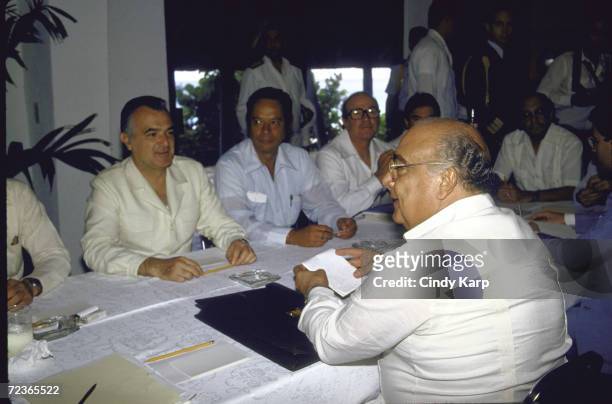 Venezuelan President Jaime Lusinchi facing Mexican finance minister Jesus Silva Herzog and Mexican President Miguel de la Madrid during an oil...