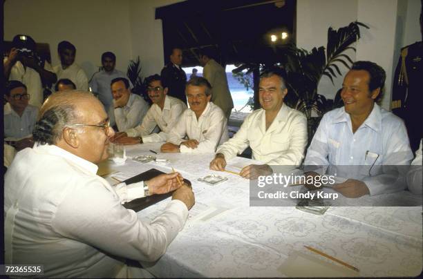 Venezuelan President Jaime Lusinchi facing Mexican finance minister Jesus Silva Herzog and Mexican President Miguel de la Madrid during an oil...