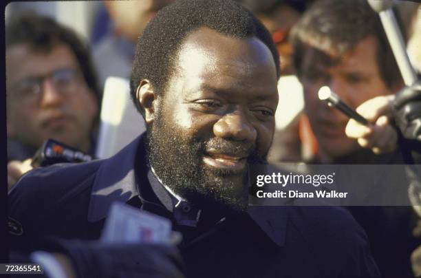 Angolan rebel leader Jonas Savimbi speaking to press after meeting with President Ronald Reagan.