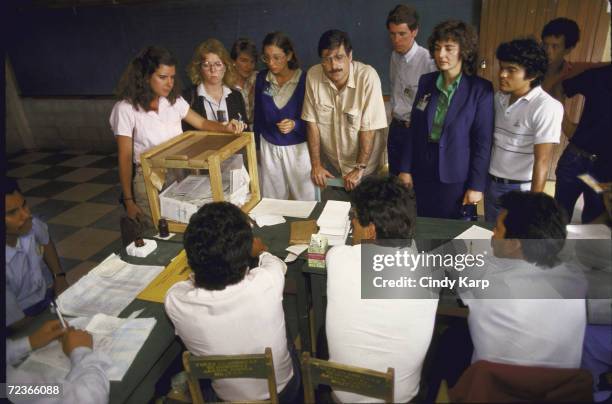 Team of US observers at polling station during President elections.