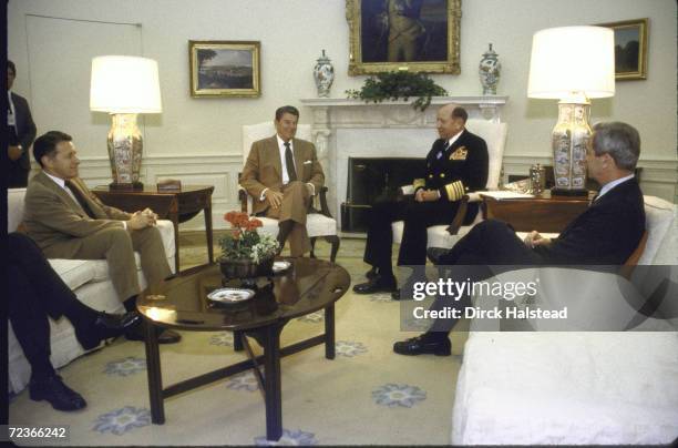 Chairman Joint Chiefs of Staff Adm. William Crowe during meeting with President Reagan , Defense Secretary Weinberger & NSC Adviser McFarlane , in...