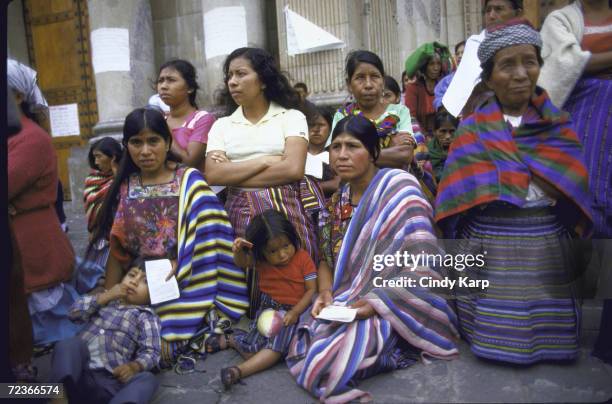 Mothers of Disappeared types hold demo, re missing relatives believed slain by right-wing mil. Government, outside Cathedral.