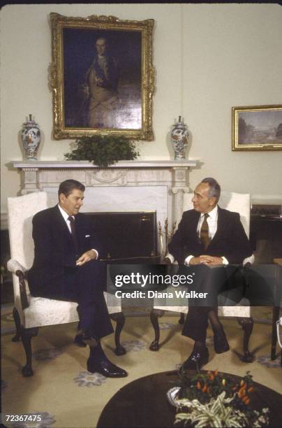 President Ronald Reagan with Israeli PM Shimon Peres in Oval Office.