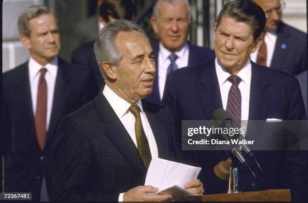 Israeli PM Shimon Peres speaking at WH ceremony with President Reagan on his side.
