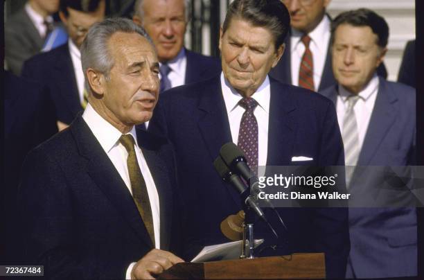 Israeli PM Shimon Peres speaking at WH ceremony with President Reagan on his side.
