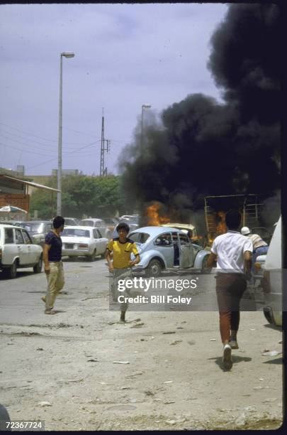 Aftermath of rocket barrage believed to have come from PLO positions above Beirut during fighting with Shiite Amal Militia for control of Palestinian...