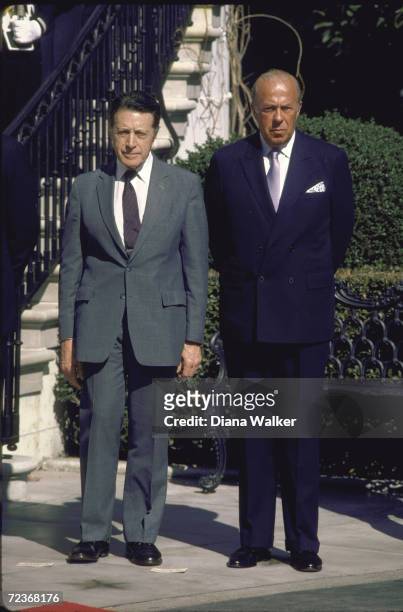 Def. Secretary Cap Weinberger with Secretary of State George Shultz at WH ceremony for Italian PM Craxi.