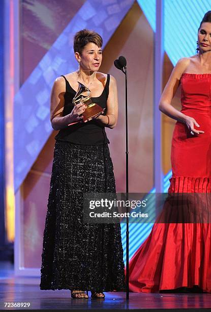 Producer Elaine Martone accepts her award for "Best Classical Album" for "Rhapsody In Blue" from presenter Barbara Palacios on stage at the 7th...