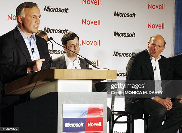 San Francisco, UNITED STATES: President and CEO of Novell Inc., Ron Hovsepian speaks as CEO of Microsoft, Steve Ballmer listens during a press...
