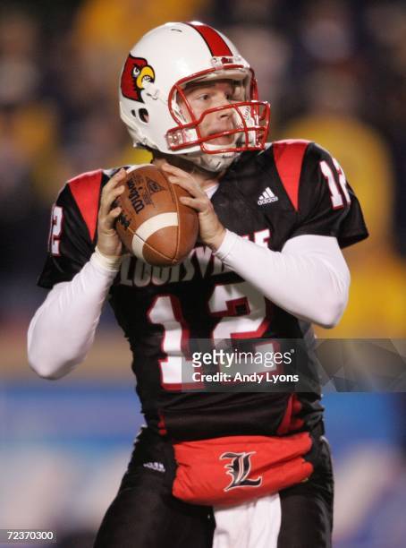 Quarterback Brian Brohm of the Louisville Cardinals looks to pass against the West Virginia Mountaineers November 2, 20006 at Papa John's Cardinal...