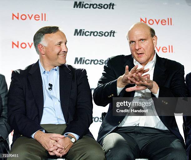 In this photo provided by Microsoft, Microsoft CEO Steve Ballmer talks as Novell President and CEO Ron Hovsepian looks on during a press event to...