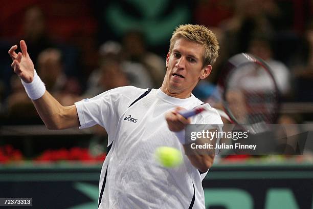 Jarkko Nieminen of Finland plays a forehand in his match against Tommy Robredo of Spain in the quarter finals during day five of the BNP Paribas ATP...