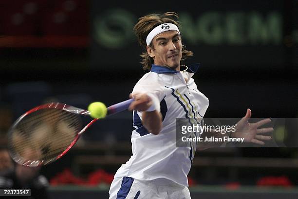 Tommy Robredo of Spain plays a forehand in his match against Jarkko Nieminen of Finland in the quarter finals during day five of the BNP Paribas ATP...