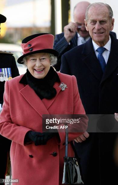 Crawley, UNITED KINGDOM: Britain's Queen Elizabeth II and Prince Phillip visit the Thomas Bennett Community College in Crawley, in West Sussex, in...
