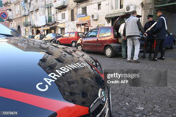 Italian Carabinieri check people in the street during a patrol in central Naples, 03 November 2006.Prime Minister Romano Prodi visited the city on...