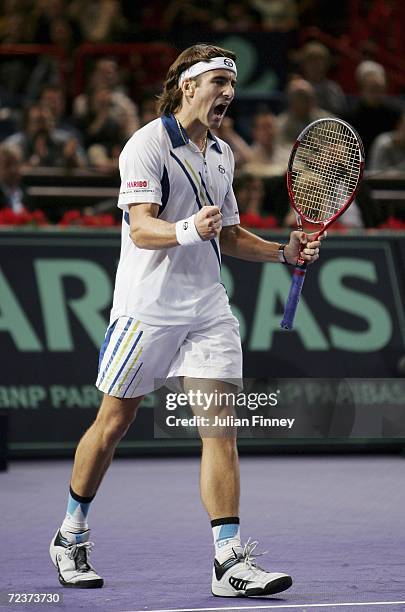 Tommy Robredo of Spain celebrates defeating Jarkko Nieminen of Finland in the quarter finals during day five of the BNP Paribas ATP Tennis Masters...