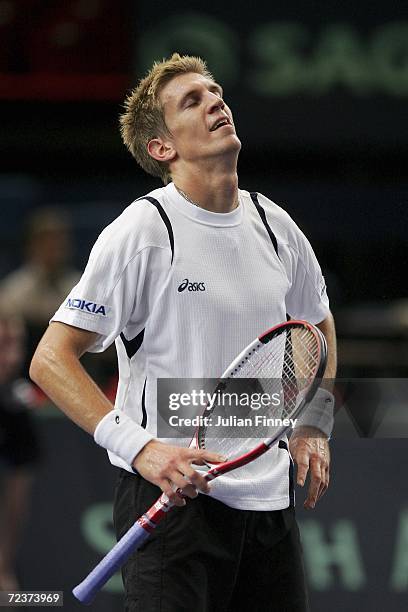 Jarkko Nieminen of Finland looks dejected in his match against Tommy Robredo of Spain in the quarter finals during day five of the BNP Paribas ATP...